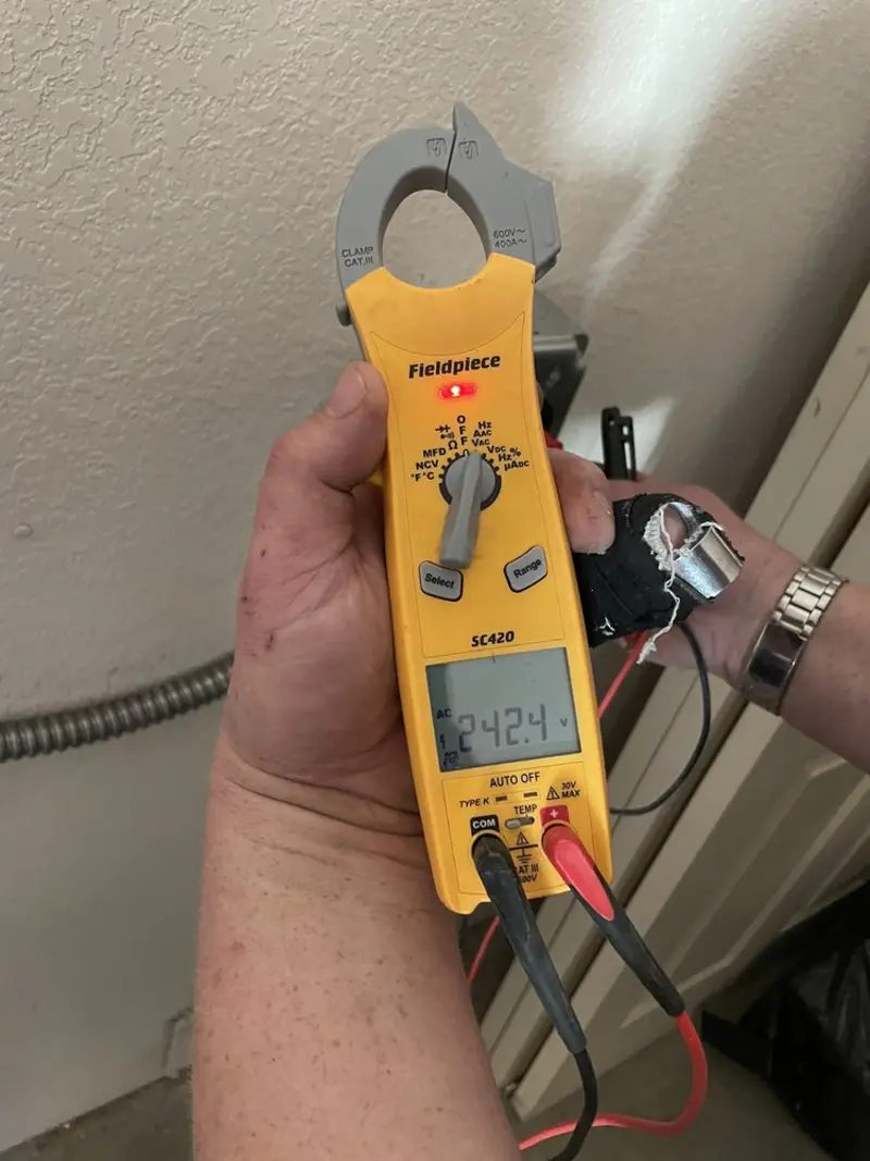 Voltage testing with clamp meter during Generator Installation in Masontown